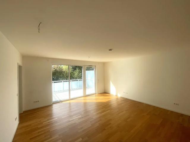 Moderne 2 Zimmer Wohnung mit großzügiger Wohnküche, großem Balkon und TG Stellplatz