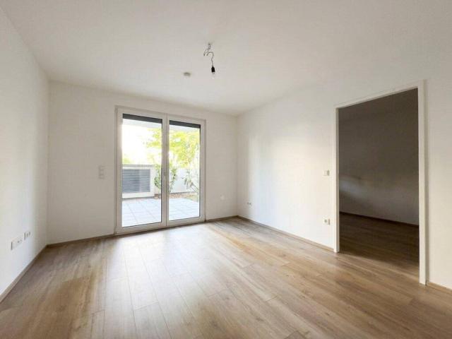 Moderne 2 Zimmer Wohnung mit kleinem Garten und Kühlung!
