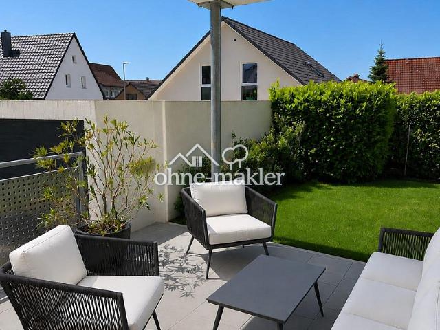 Moderne 3,5 Zimmer Erdgeschosswohnung mit großem Garten