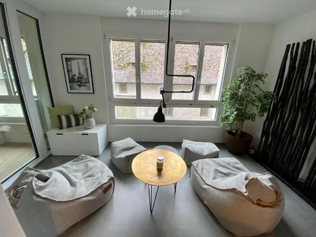 Moderne 3.5 Zimmer Wohnung mit 32 m2 Terrasse an exklusiver Lage direkt am Rhein