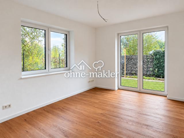 Moderne 3 Zimmer Neubauwohnung mit zwei eigenen Gartenbereichen, Terrasse und Stellplatz