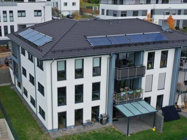 Moderne 3 Zimmer Eigentumswohnung im OG 2 Carports