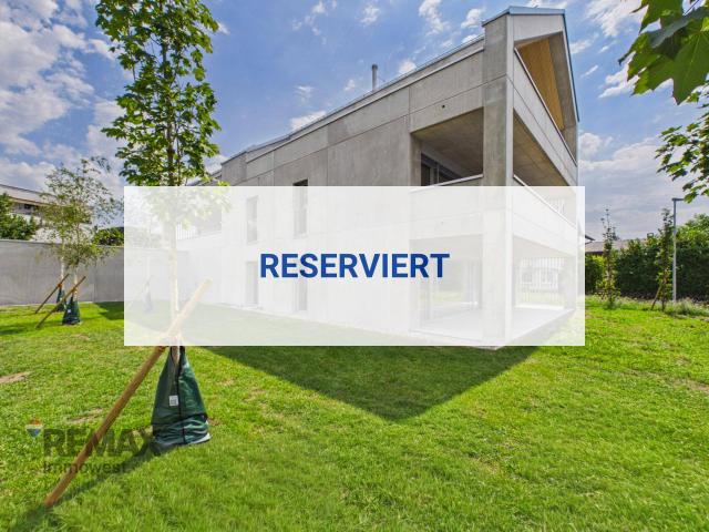 Moderne 3 Zimmer Erstbezugswohnung mit privatem Garten, großen Fensterfronten und viel Tageslicht