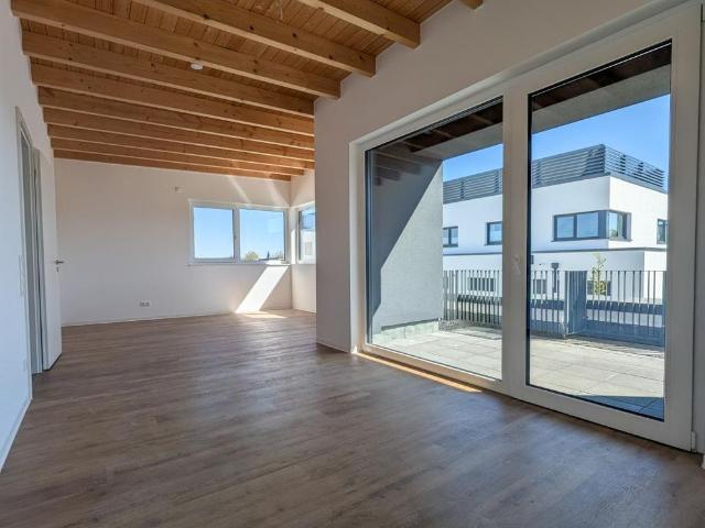 Moderne 3 Zimmer Penthousewohnung mit Südbalkon und nachhaltigem Energiekonzept mit Warmmiete