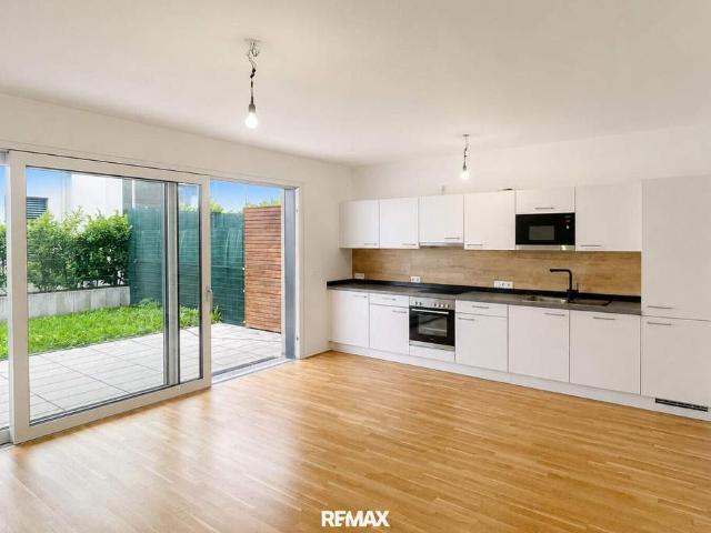 Moderne 3 Zimmer Wohnung mit eigenem Garten & Terrasse