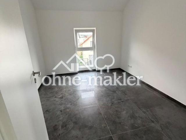 Moderne 4 Zimmer Neubauwohnung mit Einbauküche, Balkon und Stellplatz in Rodenbach