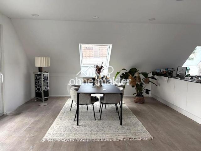 Moderne 4 Zimmer Dachgeschosswohnung mit Loggia, TG Stellplatz & Wallbox – Energieklasse A