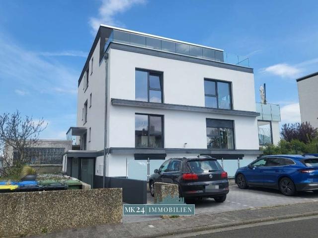 Moderne 4 Zimmer Wohnung mit Balkon, Einbauküche und zwei PKW Stellplätzen – ideal für Familien!