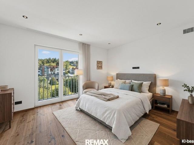 Moderne 4 Zimmer Wohnung mit Sonnigem Balkon, Optionalem Tiefgaragenplatz und Barrierefreiem Zugang im Zentrum von St. Johann in Tirol