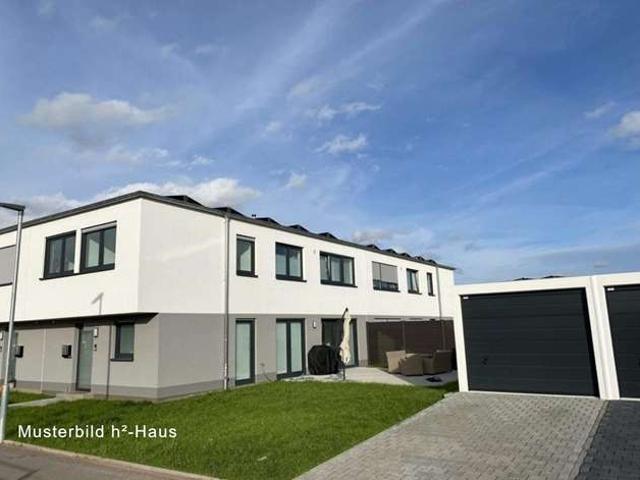 Modernes Wohnen am Heidesee – hochwertiges Reiheneckhaus mit PV Anlage, sonniger Terrasse und Garage