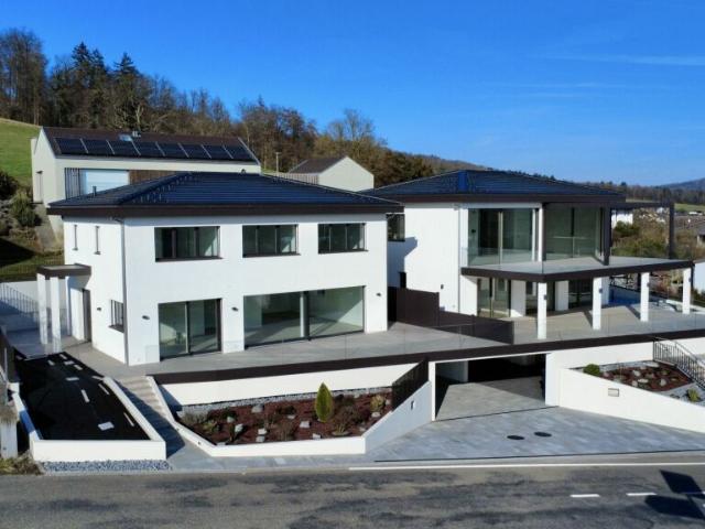 Modernes Wohnen auf höchstem Niveau Minergie Villa mit Bergblick