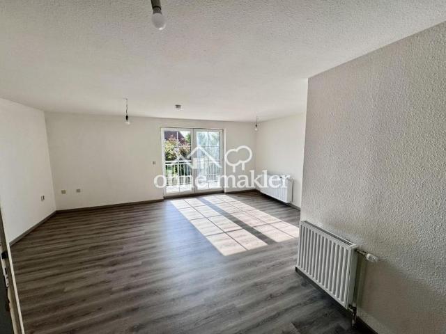 Modernes Wohnen auf zwei Ebenen: Helle, teilmodernisierte 3 Zimmer Maisonette Wohnung in Mölln