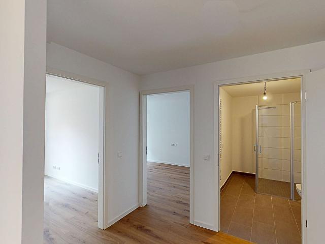 Modernes Wohnkonzept: 3 Zimmer Erdgeschosswohnung mit EBK und Terrasse