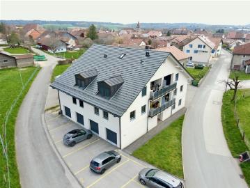 Modernes Wohnhaus mit 6 Einheiten im Herzen des Dorfes