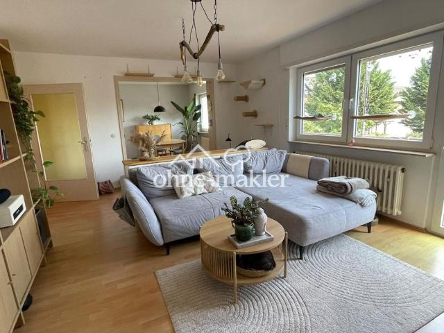 Modernes Zuhause mit Parkblick – 4 Zimmer Wohnung mit großem Süd Balkon & Garage