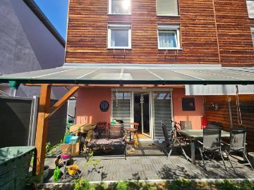 Modernes Eckreihenhaus mit Garten und Doppelcarport in beliebter, sonniger Siedlungslage