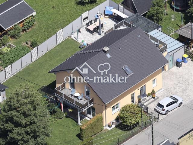 Modernes EFH mit Erdwärme, Wintergarten & großzügigen Terassen