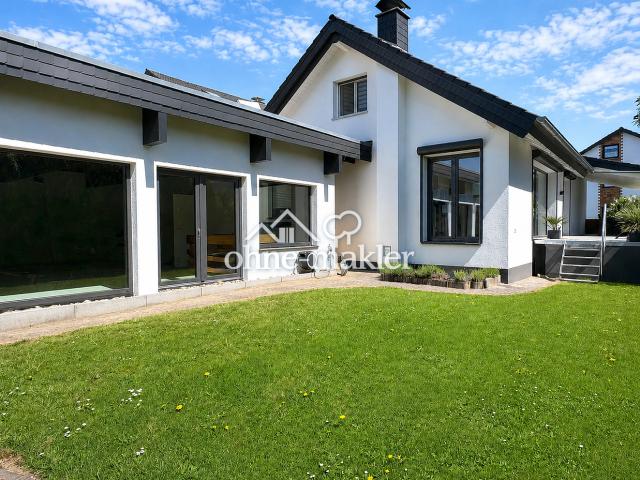 Modernes Einfamilienhaus mit Anbau, Kamin, Sauna & Sonnenterrasse 260m² Wohnflächenpotenzial