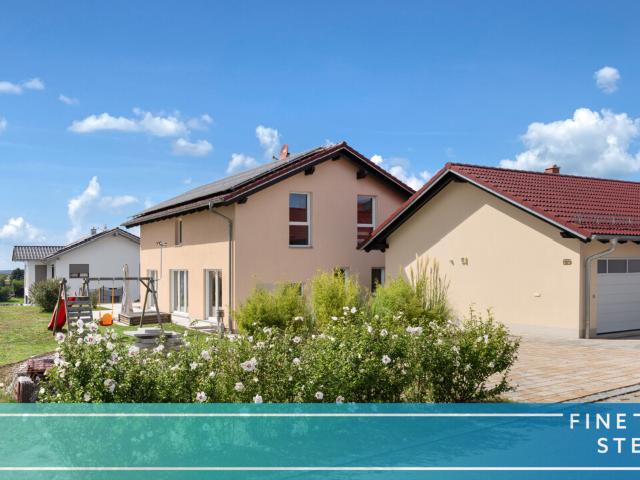 Modernes Einfamilienhaus mit Dreifachgarage & Alpenblick – München gut erreichbar