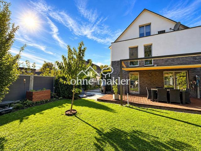 Modernes Einfamilienhaus mit stilvollem Wohnambiente, wunderschönem Garten und Sauna