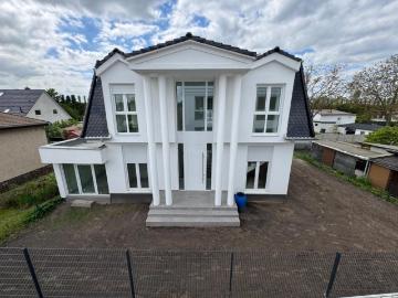 Modernes Einfamilienhaus Neubau mit Fußbodenheizung und Küche