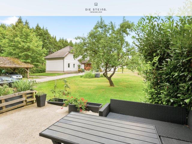 Modernes Familienidyll: 4 Zimmer Gartenwohnung mit Terrasse & Grünblick