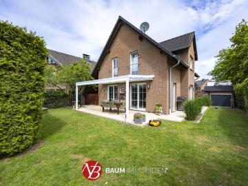 Modernes, freistehendes Einfamilienhaus im Ortskern von Lank Latum Baum Immobilien GmbH