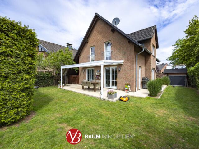 Modernes, freistehendes Einfamilienhaus im Ortskern von Lank Latum Baum Immobilien GmbH