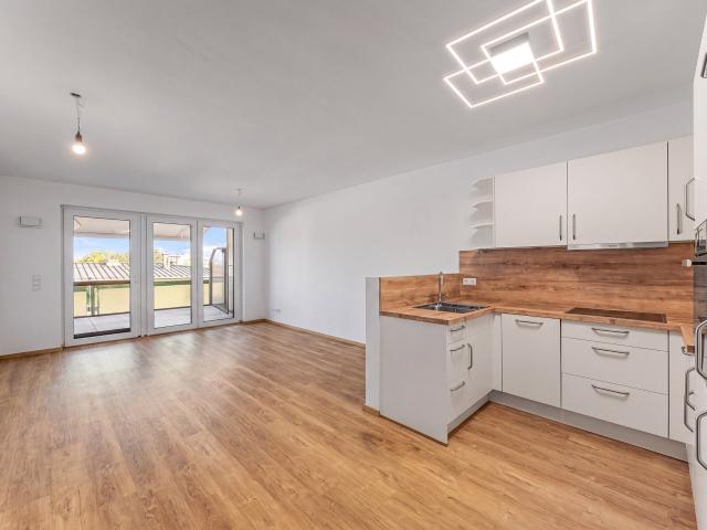 Modernes KfW 55 Apartment mit großzügiger Terrasse und hochwertiger Ausstattung – sofort bezugsfrei
