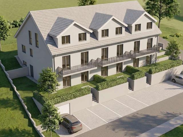 Modernes Neubau Reihenhaus mit Einliegerwohnung, Garten und 2 Stellplätzen – ideal für Familien