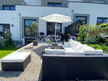 Exklusives Gartenhofhaus mit Garten, 2 Tiefgaragenstellplätzen und moderner Energietechnik
