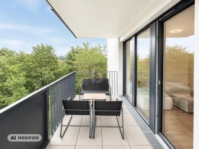 MODERNER WOHNTRAUM MIT GROßZÜGIGEM BALKON & BLICK INS GRÜNE