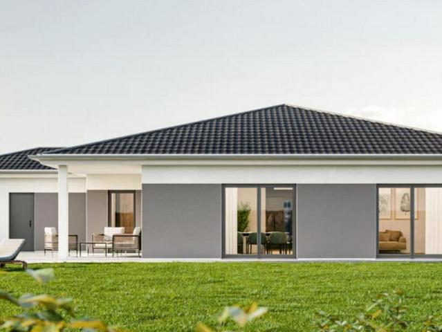 Moderner Bungalow mit überdachter Veranda und Garage naturnah wohnen mit durchdachtem Wohnkonzept