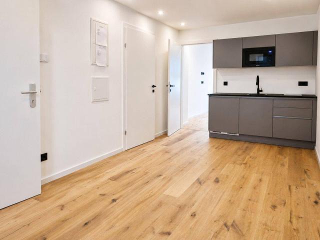 moderner Erstbezug mit kleiner Terrasse für Anleger oder Eigennutzer