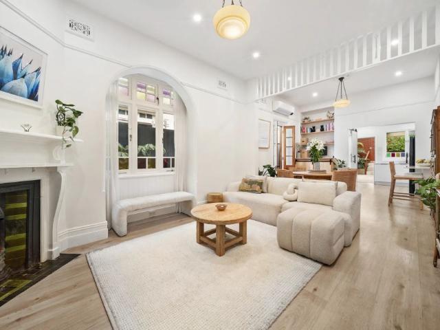 Modernised terrace with versatile attic retreat close to the Bay Run