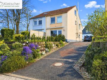 Modernisierte Doppelhaushälfte mit Ost, u. West Terrasse, Kamin in Wermelskirchen