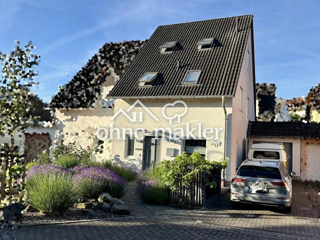 Modernisierte Doppelhaushälfte mit Wintergarten, Garage, Werkstatt und Traumgarten!