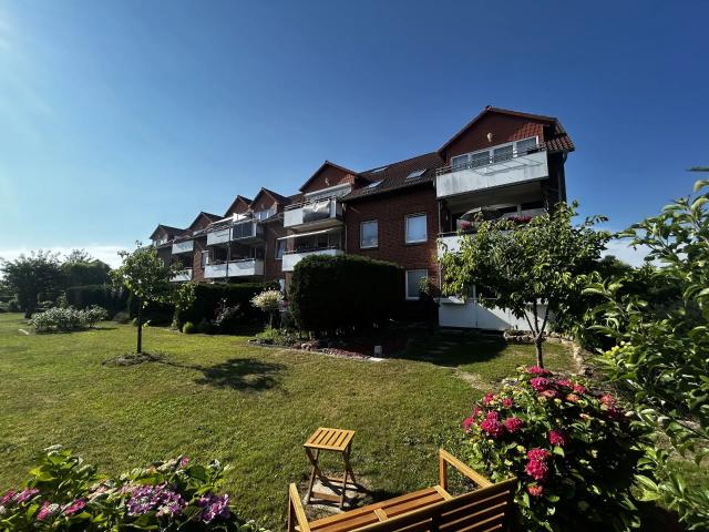 Modernisierte Eigentumswohnung mit Südbalkon, Einbauküche & Stellplatz