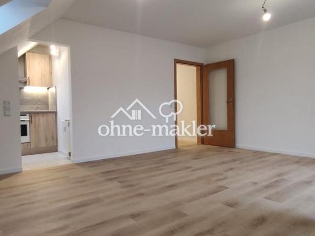 Modernisierte 2 Zimmer Wohnung im 2. OG mit EBK, Balkon, KFZ Stellplatz und Kellerabteil