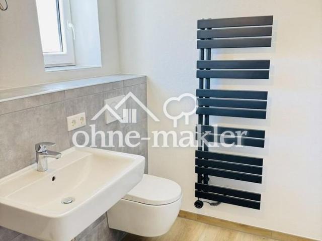 Modernisierte 3 Zi. Wohnung mit Terrasse – Erstbezug nach Kernsanierung