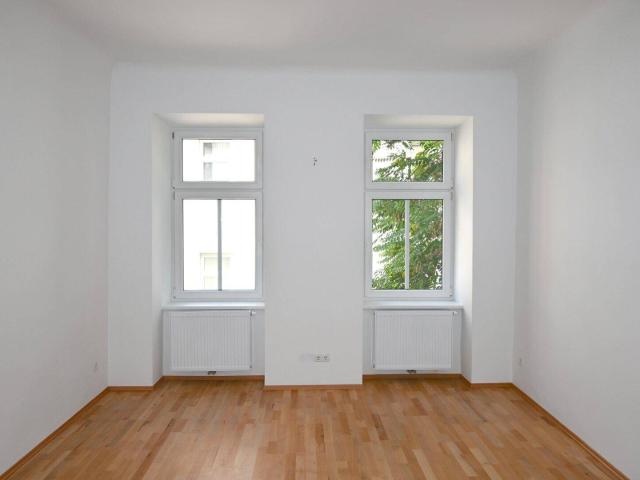 Modernisierte 3 Zimmer Wohnung mit zwei Bädern in hofseitiger Ruhelage