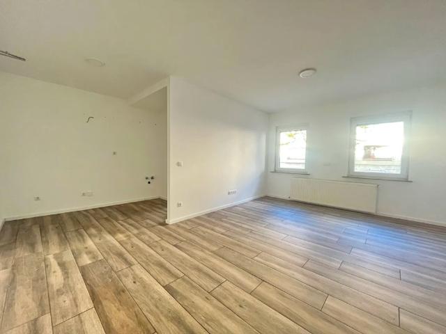 Modernisiertes 1 Zimmer Apartment mit eigener Garage