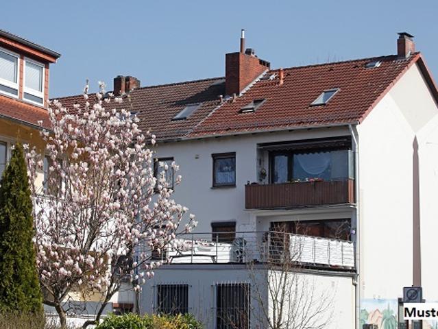 Modernisiertes Wohn und Geschäftshaus