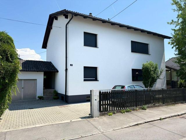 Modernisiertes Ein bzw. Zweifamilienhaus mit Vollunterkellerung, großzügigem Wintergarten und neuer Wärmepumpe