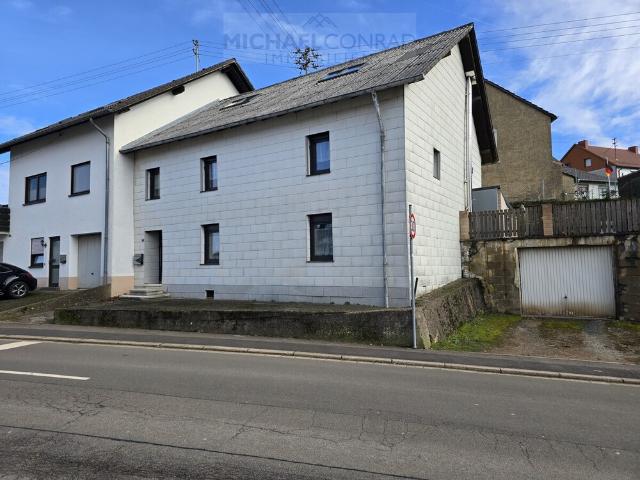 Modernisiertes Einfamilienhaus mit Einliegerwohnung Schmelz zentral