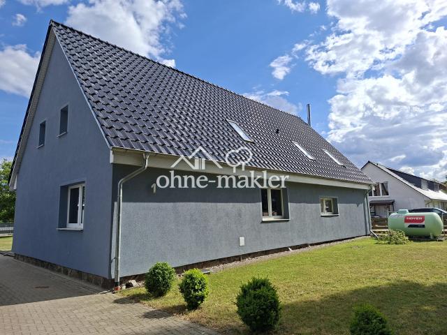 Modernisiertes Einfamilienhaus mit Einliegerwohnung, Werkstatt und großem Grundstück in Blumenholz