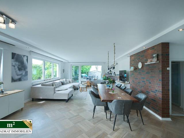 Modernisierter Bungalow mit Einliegerwohnung, viel Privatsphäre und idyllischem Grundstück