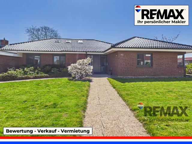 Modernisierter Bungalow mit kleiner Gewerbeeinheit in belebter Lage