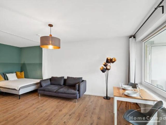 Modernly furnished 1 room apartment with balcony