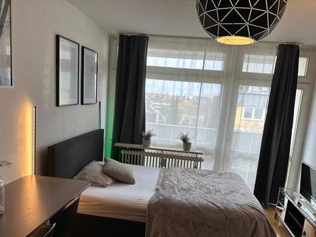 Modernly furnished 1 room apartment with balcony